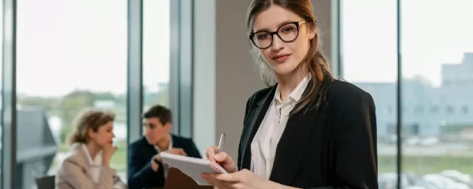 People in corporate wear in an office setting