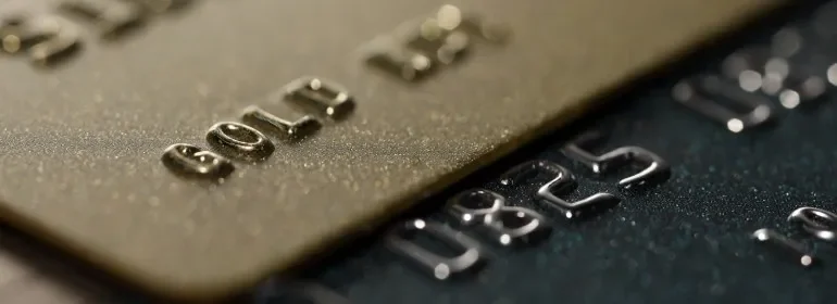  Multiple credit cards arranged side by side, highlighting their unique patterns and branding.